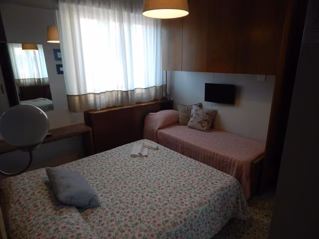 Letto della camera del ristorante La Terrazza a Borgo San Pietro